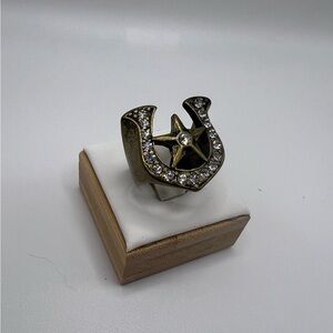 Gold Horseshoe Ring with Intricate Detailing